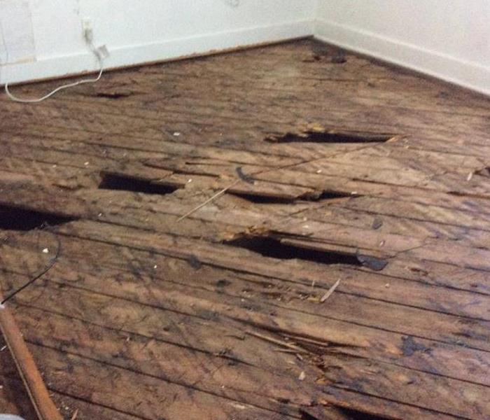 Rotted flooring from trapped water